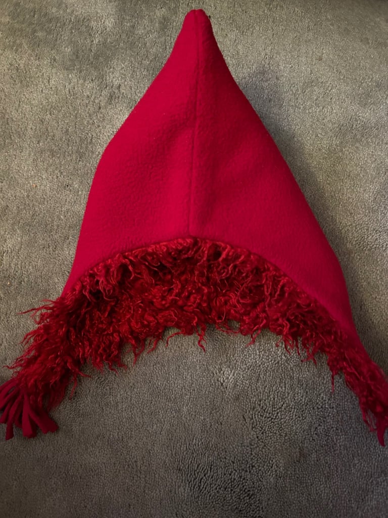 image for Red fuzzy fleece hat with tassels. .  