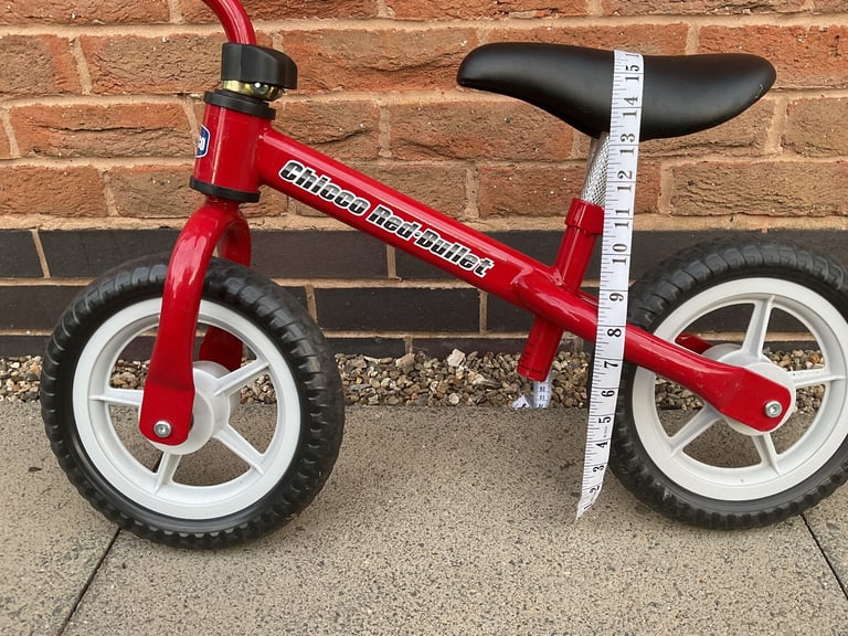 image for Chicco red bullet balance bike as new 10 inch wheels adjustable saddle perfect 