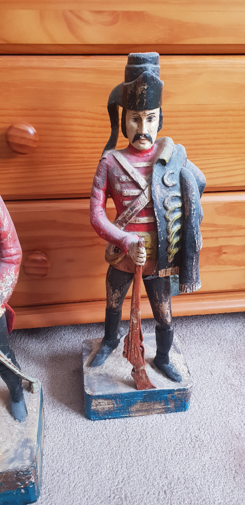 Three wooden carved sculptures 