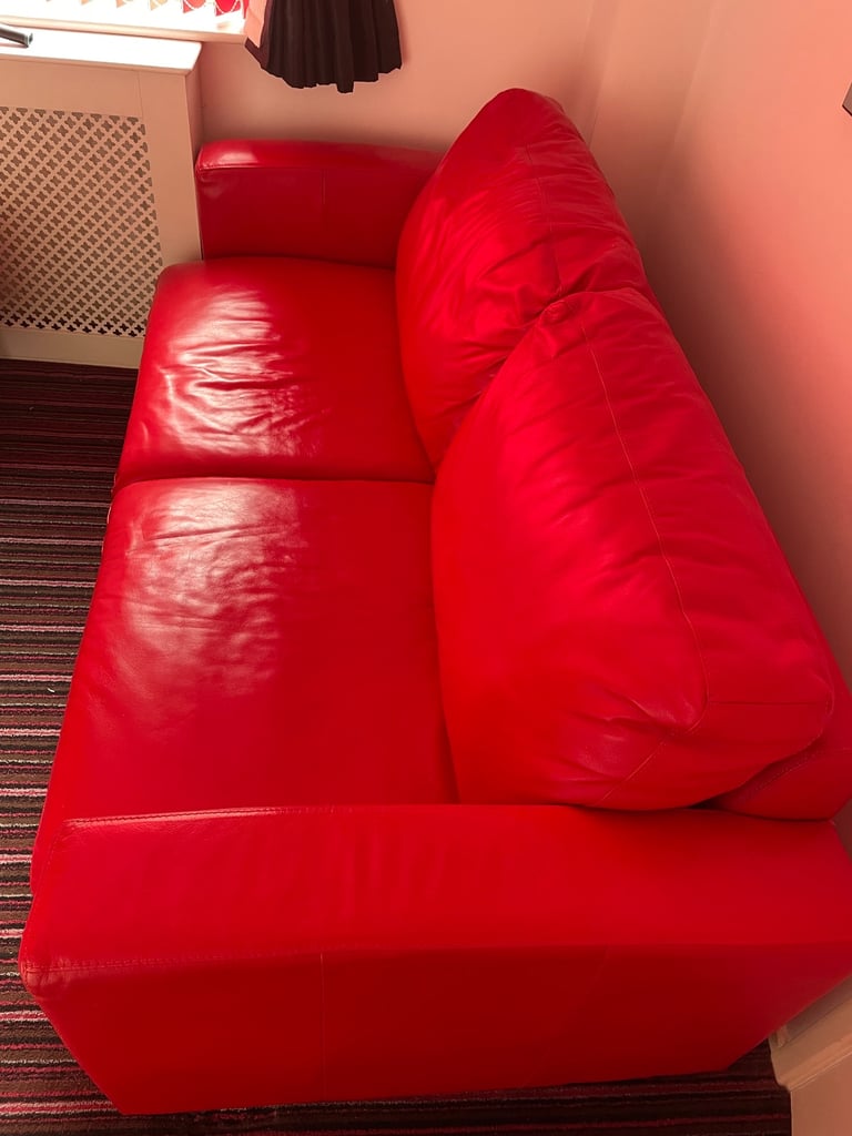 Red leather sofa bed