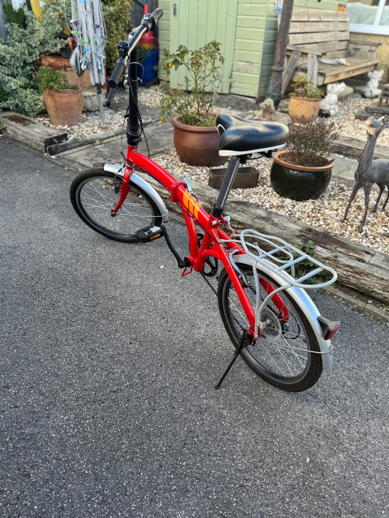 anywhere folding bicycle extremely easy to open up and close . 