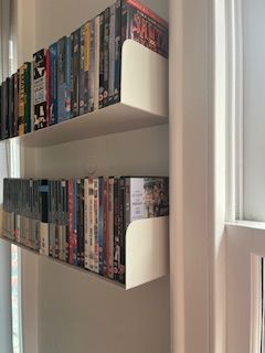image for Invisible metal book shelves