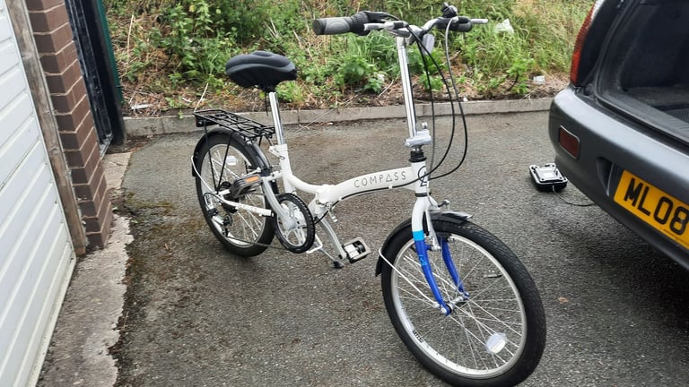2 Compass Folding bikes.