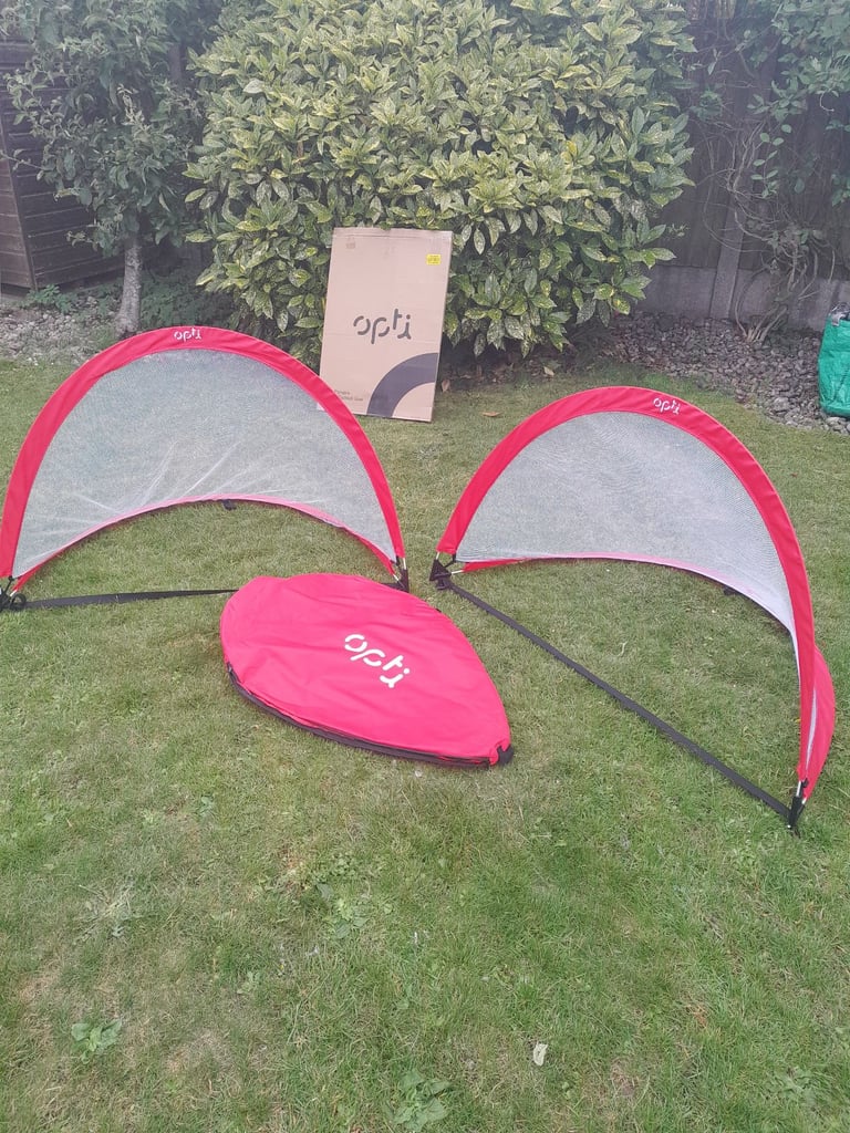 Twin portable pop up football by opti at Argos.  Plus storage bag and box