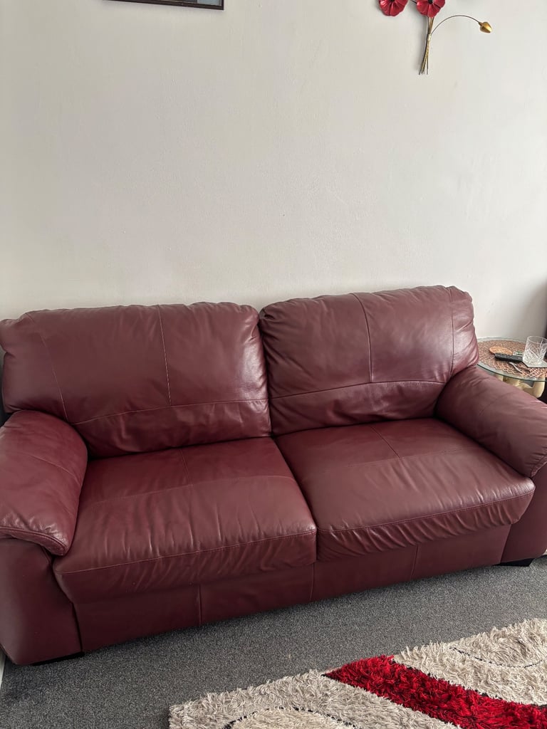 Burgundy leather 3 seater and chair 