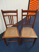 2 matching wooden chairs