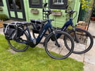 2 x Raleigh Motus Tour Plus (Medium and Small) Plus Thule EasyFold Bike Rack and many Extras