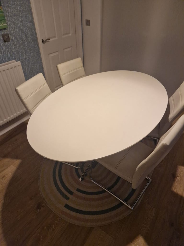 Dwell Dining table and 4 chairs.