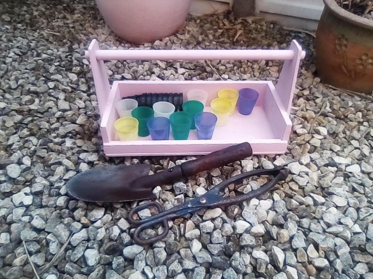 image for Pink wooden garden trug and gardening accessories.