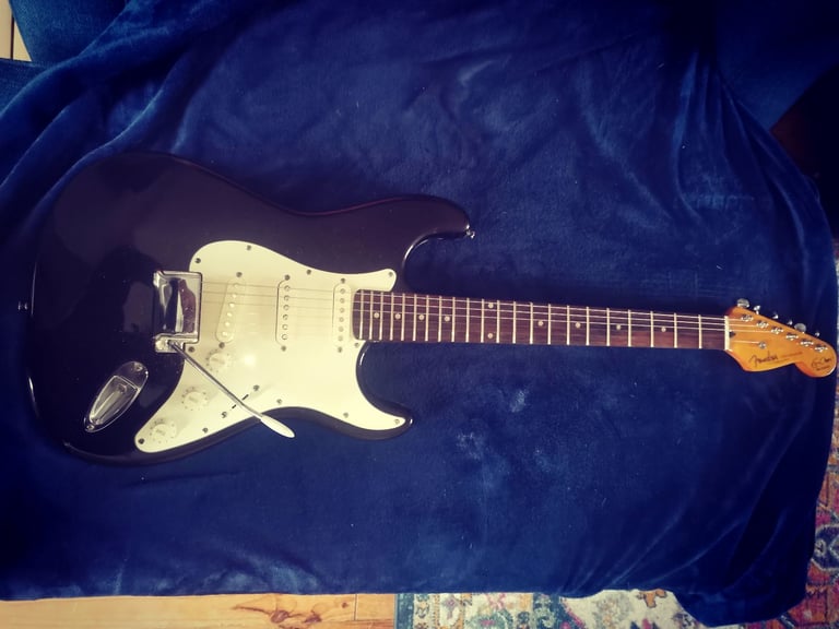 Black metalic stratocaster made in Japan 
