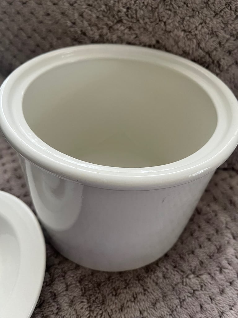 White ceramic jar with lid