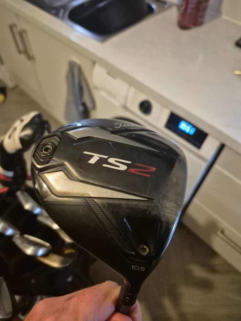 Full set titleist irons,driver, 3 wood, hybrid, mizuno rusty wedges and titleist bag 