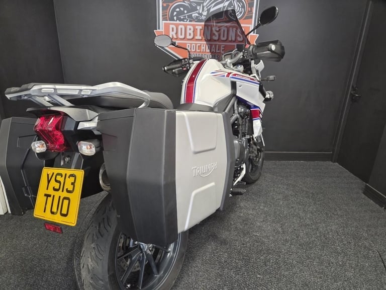 2013 Triumph Tiger Explorer 1215 in white with luggage.