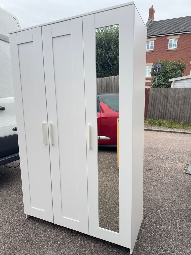 IKEA BRIMNES 3-Door Wardrobe with Hanging Rail and Shelves.