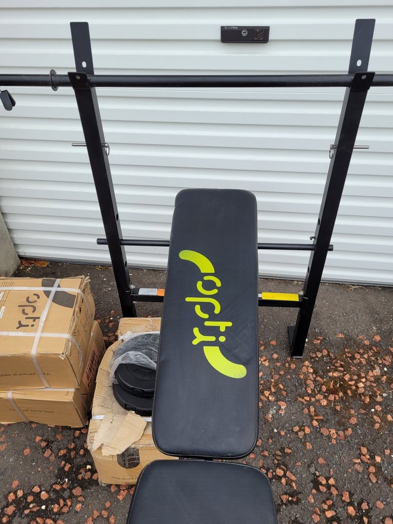 image for Brand new weight bench with 30kg weights 