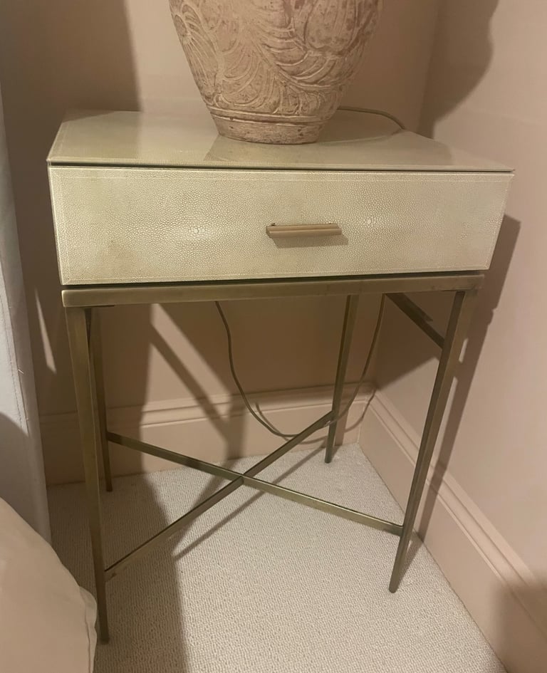 Two bed side tables.  Antique brass and glass finish 