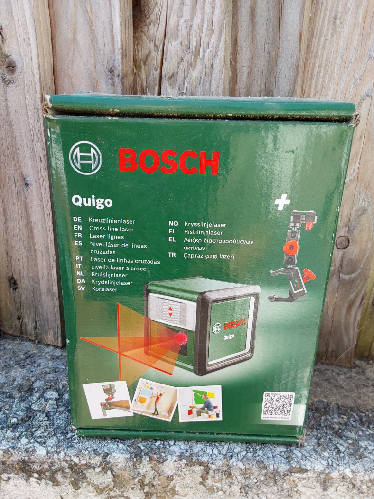 Bocsh laser level with tripod floor to cieling stand both not use