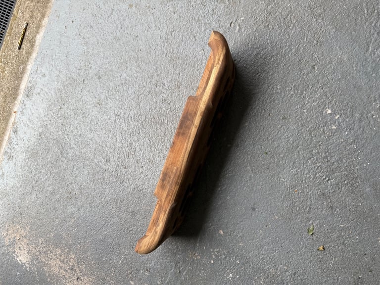 Wood grips rock climbing hold 