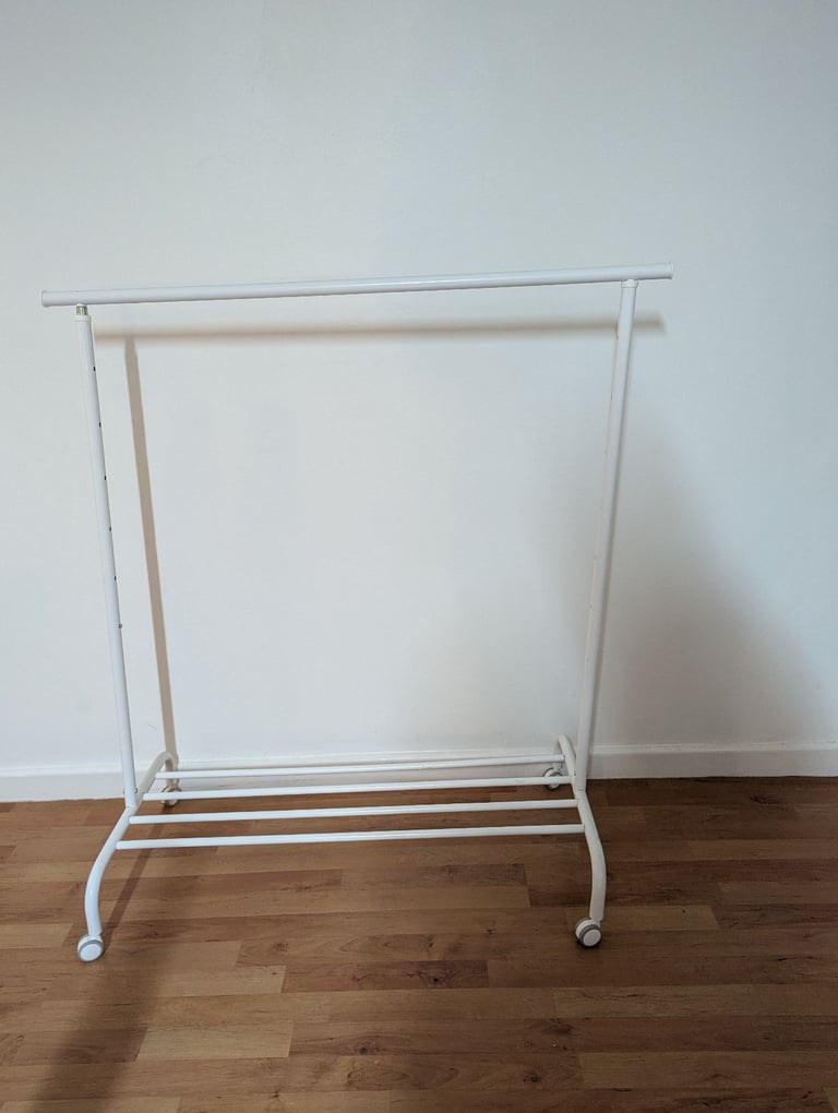 image for For Sale Clothes rack with shelf plus free 