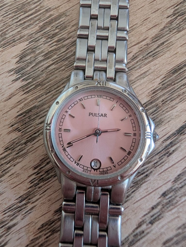 Ladies Pink Faced Pulsar Watch with Calender.