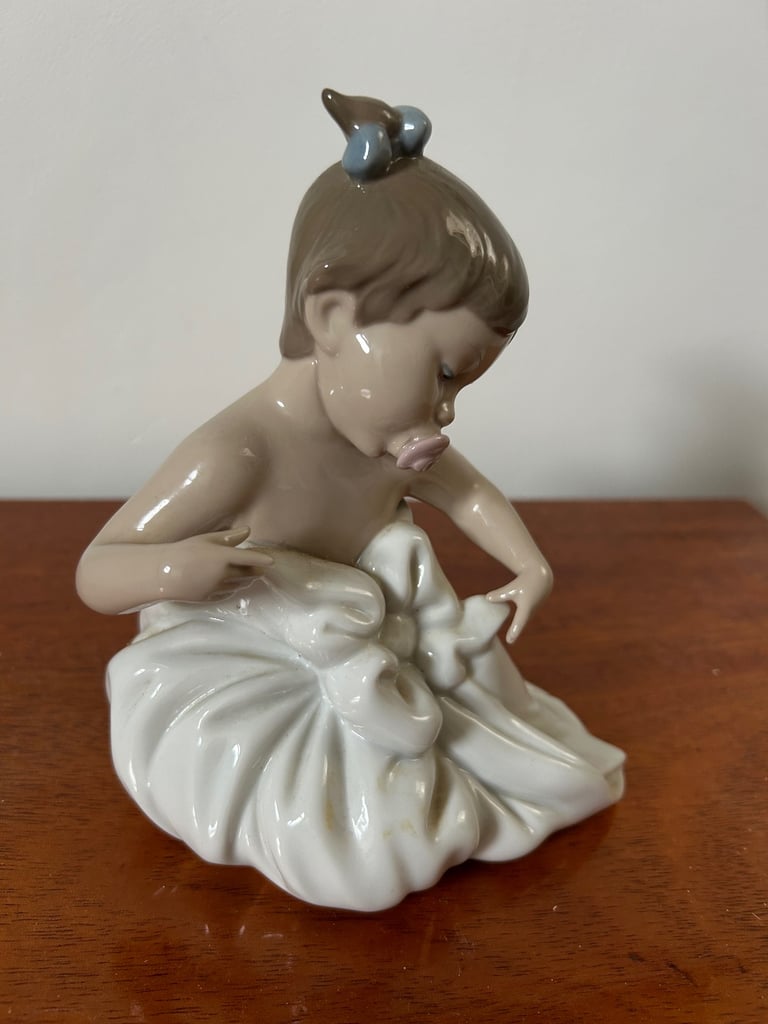 NAO by Lladro girl in blanket