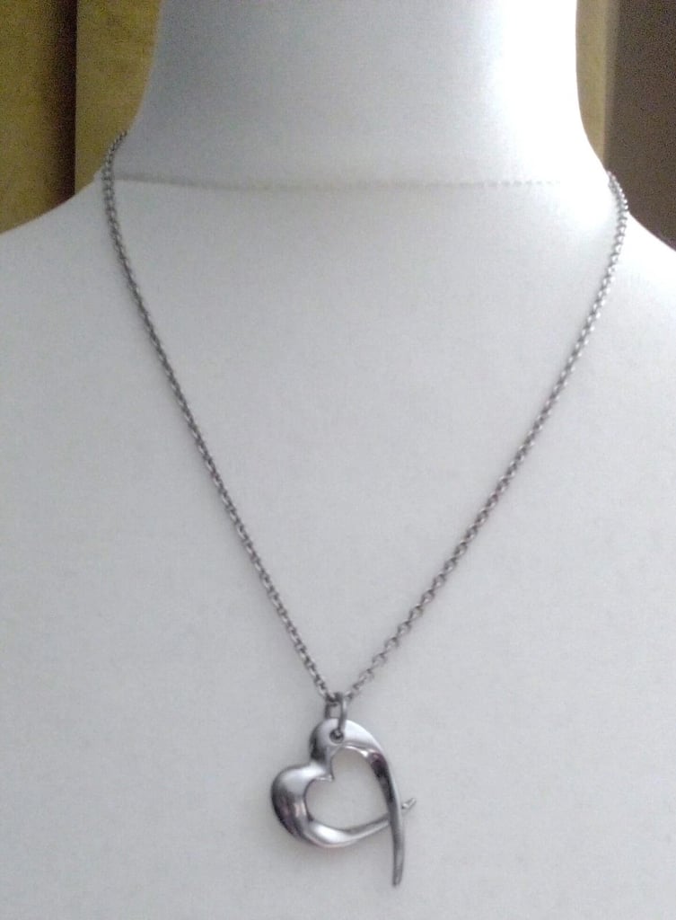 New Silver Toned Necklace with Heart Pendant.POST OT COLLECT!