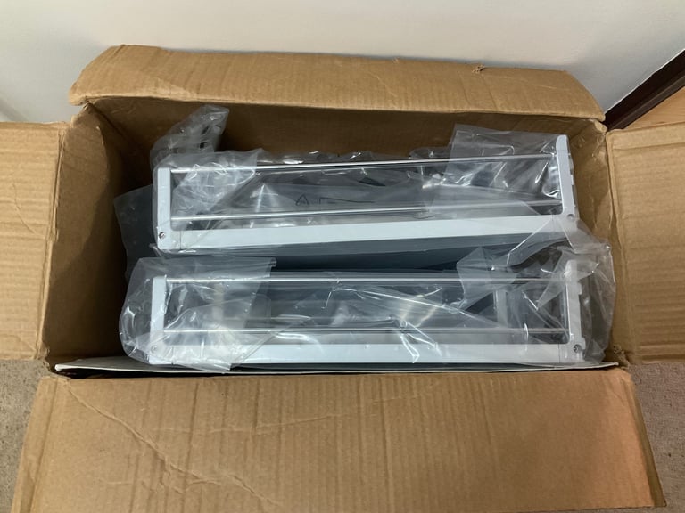 Brand new .Magic corner pull out basket system for Left Hand opening on corner unit.