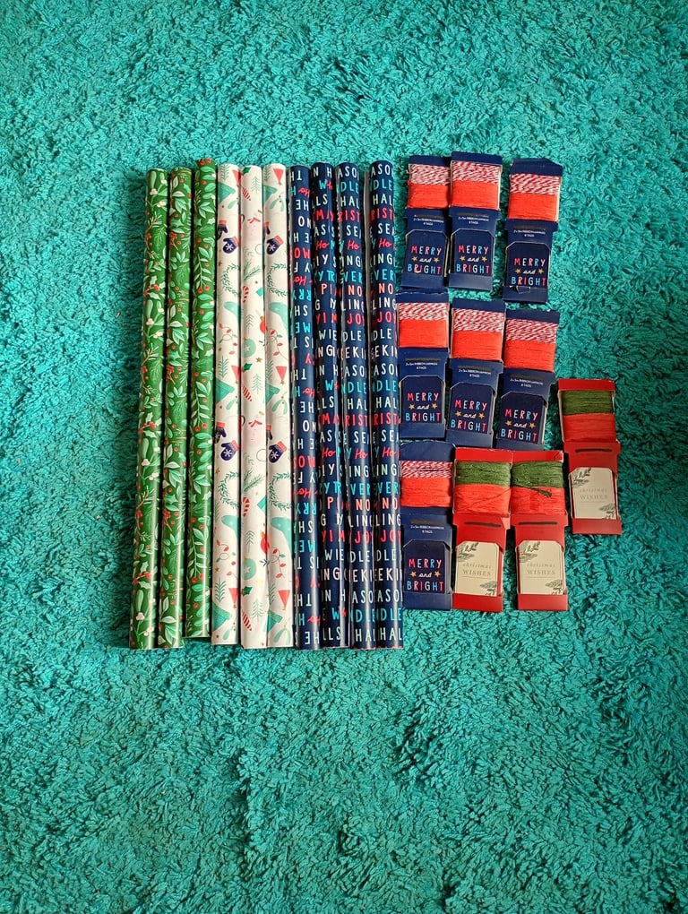 Wrapping paper 10 rolls, 80 tags, ribbon 100meters for £10 ono.All new