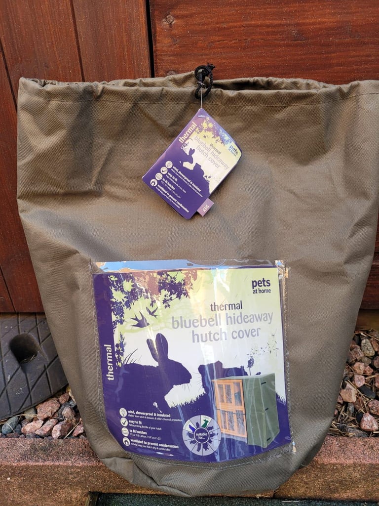 2 storey rabbit hutch with thermal rain cover.