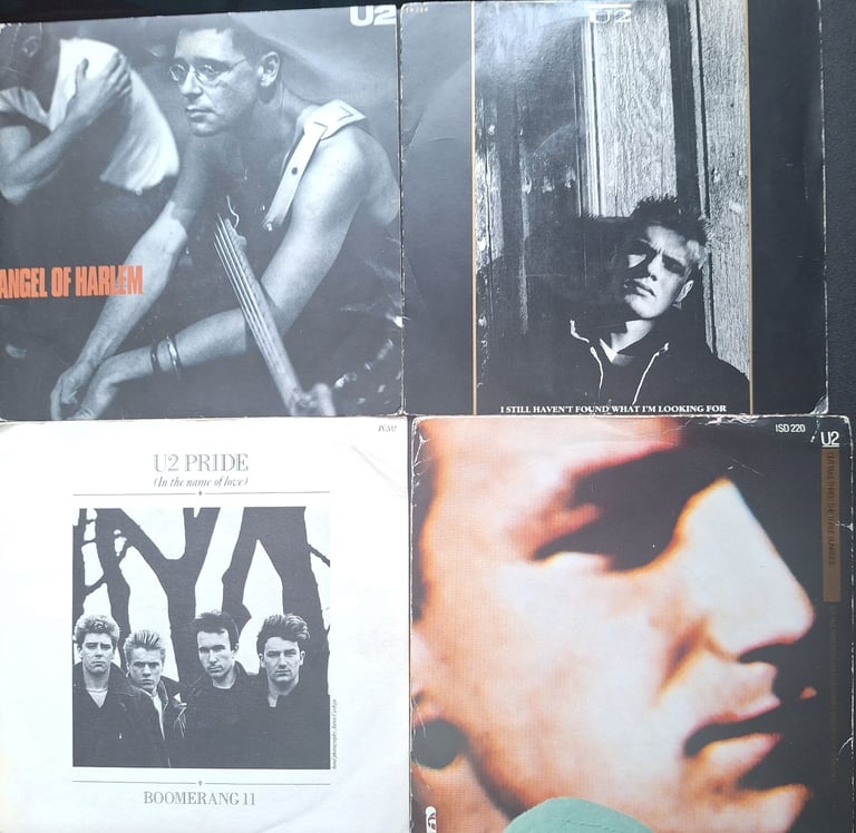 U2 vinyl singles 8 including a double single