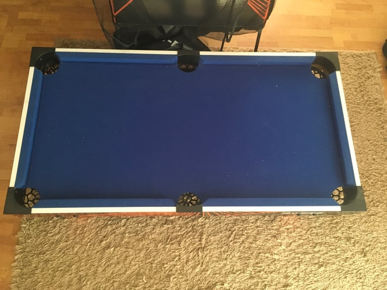 Four in one games table. Snooker,table tennis, air hockey and basketball.