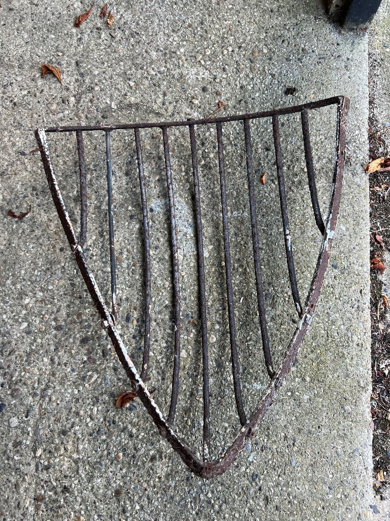 Large vintage cast iron hay basket 