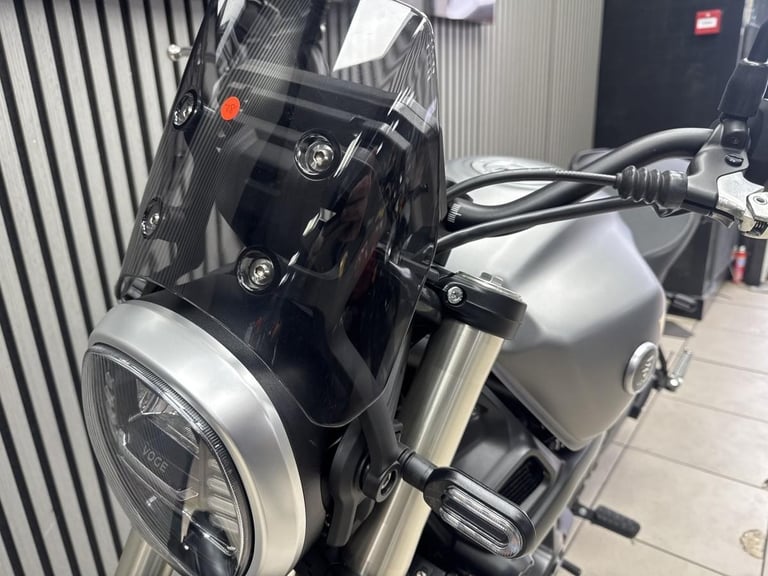 Voge ac525X in grey with yellow decals and only 211 Miles retro adventure