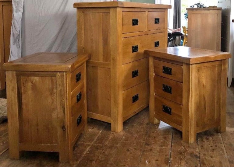 image for Rustic solid oak chest of drawers and bedside tables from Oak Furniture Land  excellent condition 