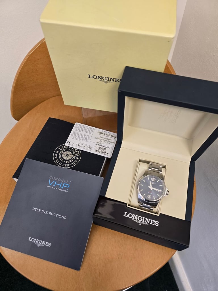 image for LONGINES CONQUEST V.H.P QUARTZ CALENDAR WATCH L3.716.4