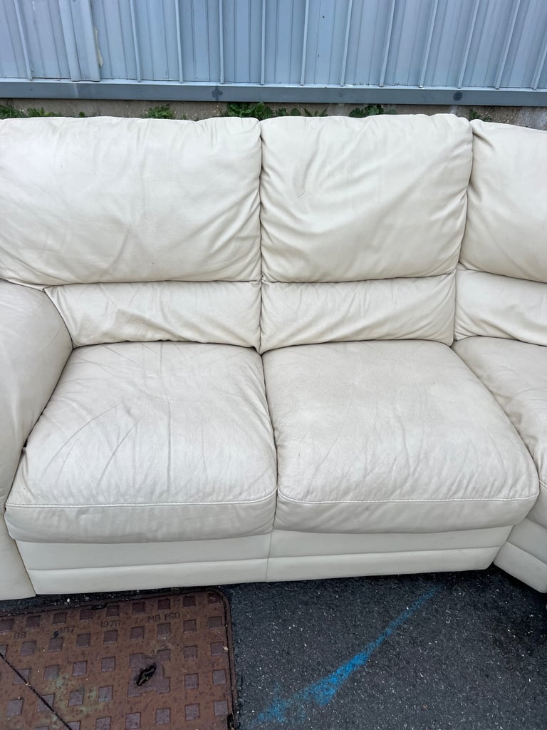 Cream leather corner sofa with recliner 