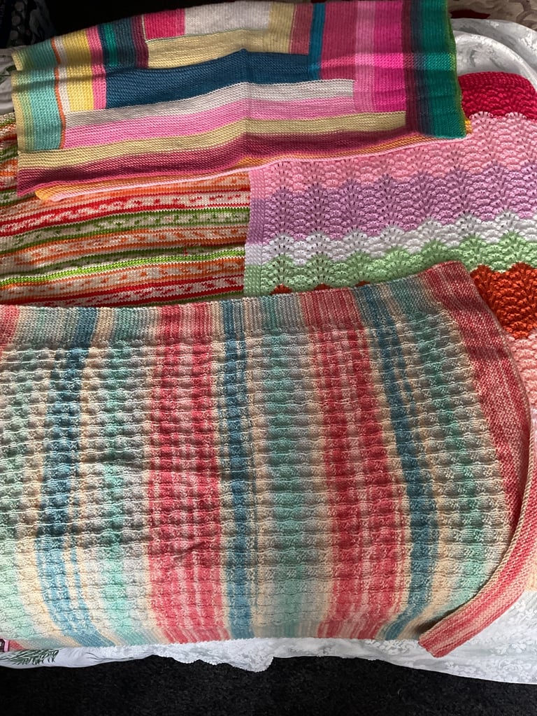 Baby cardigans/jackets etc, blankets and shawls, all hand knitted
