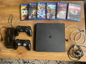 PS4 2TB 2 controllers 6 games