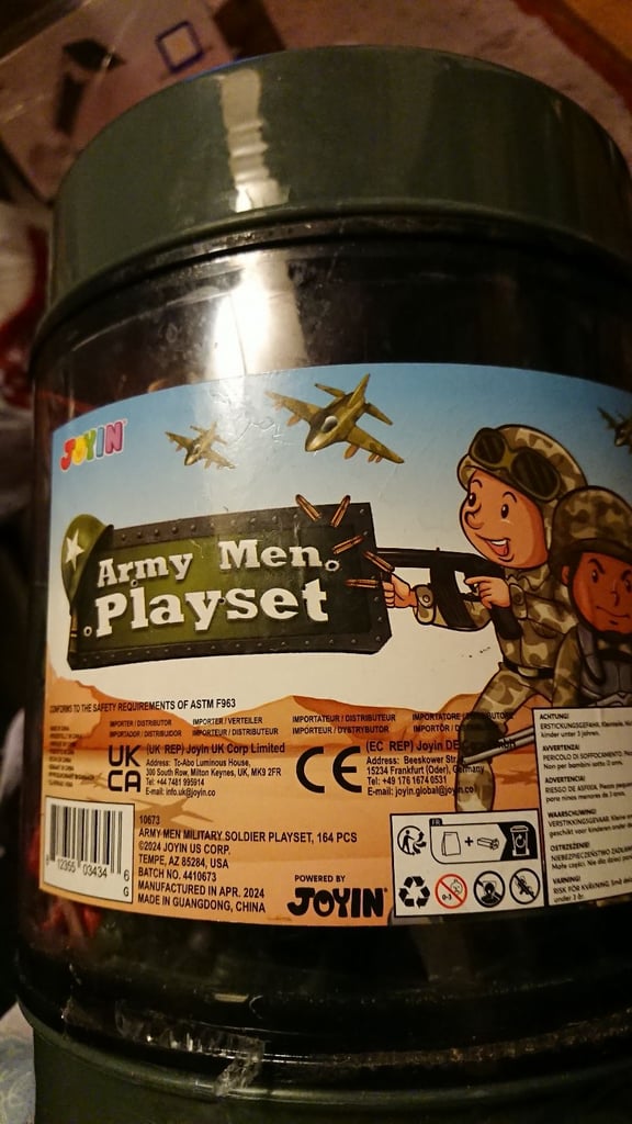Army men play set in a container 