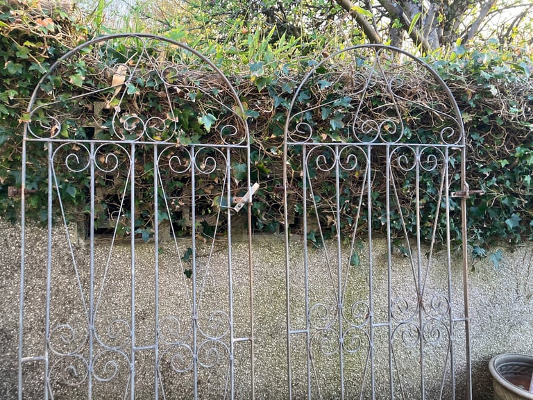 Set of 2 wrought iron scrolled gates , archway shaped unpainted 