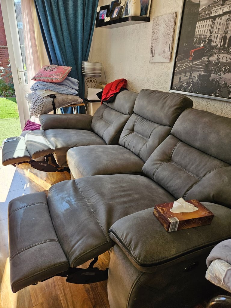 Grey leather reclyner 