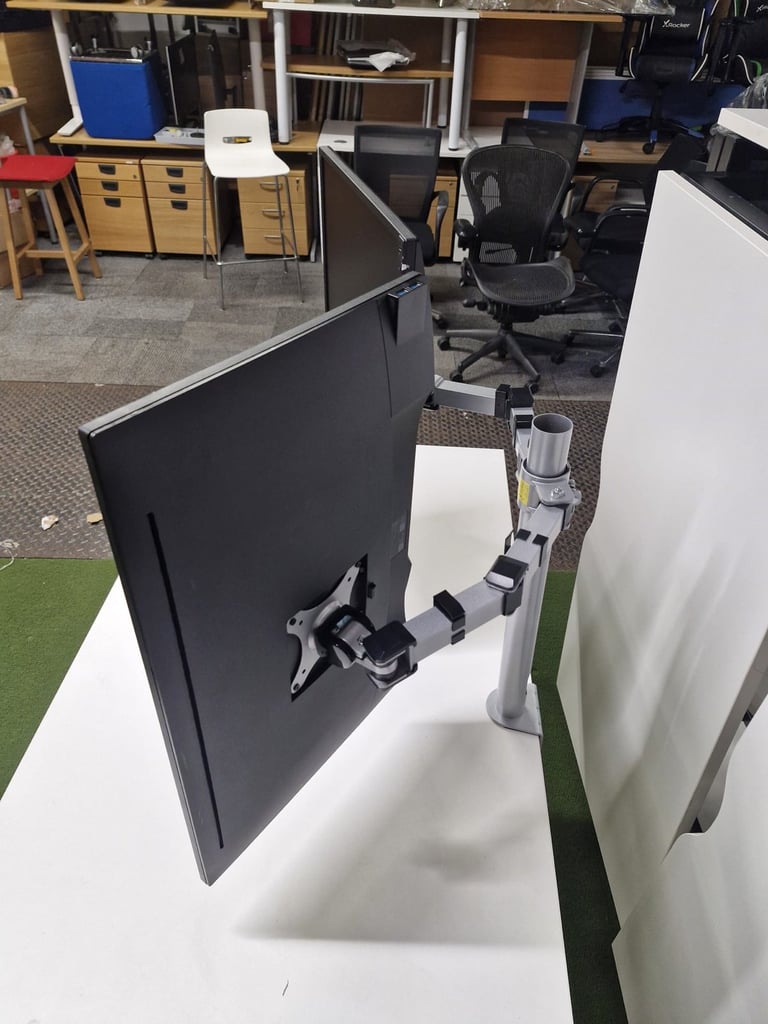 Dual Dell 27 inch Hdmi monitors with a dual arm setup (50 available)