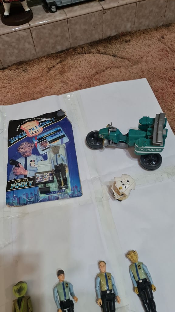 Space precinct figures and captain scarlet doll