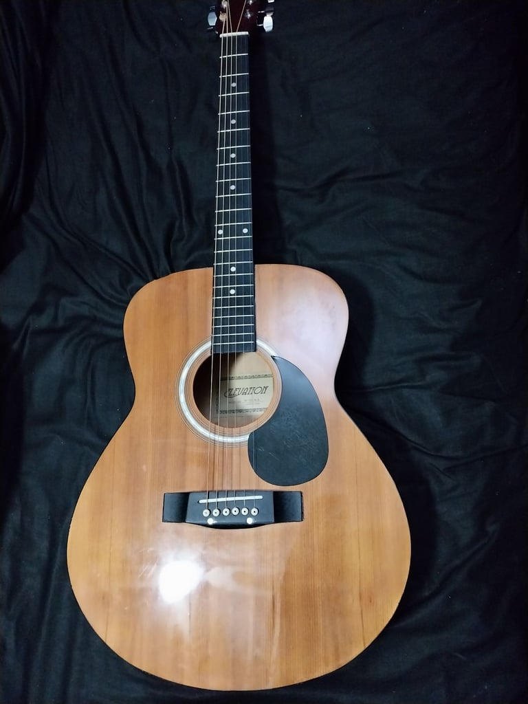 Full size steel string guitar