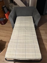 Grey love chair/ single sofa bed from Leekes