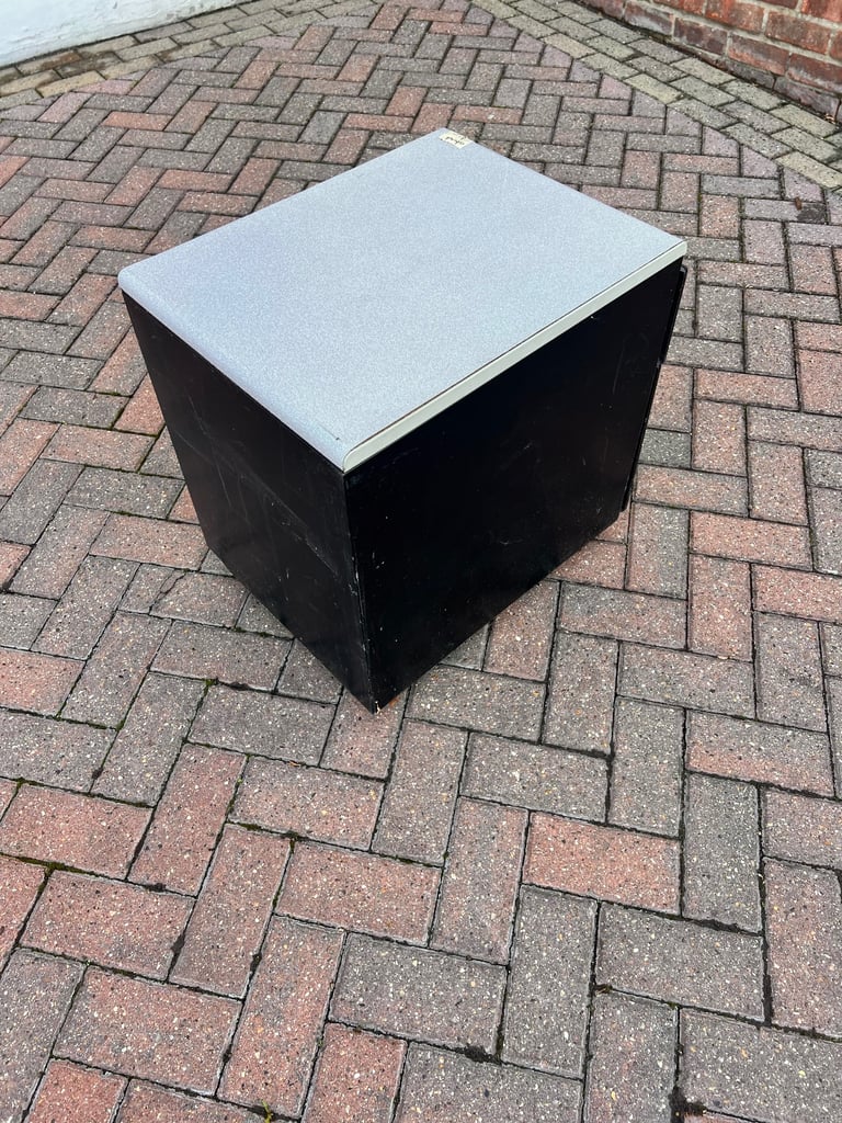 Filing cabinet / storage with 2 drawers black metal with grey worktop. 