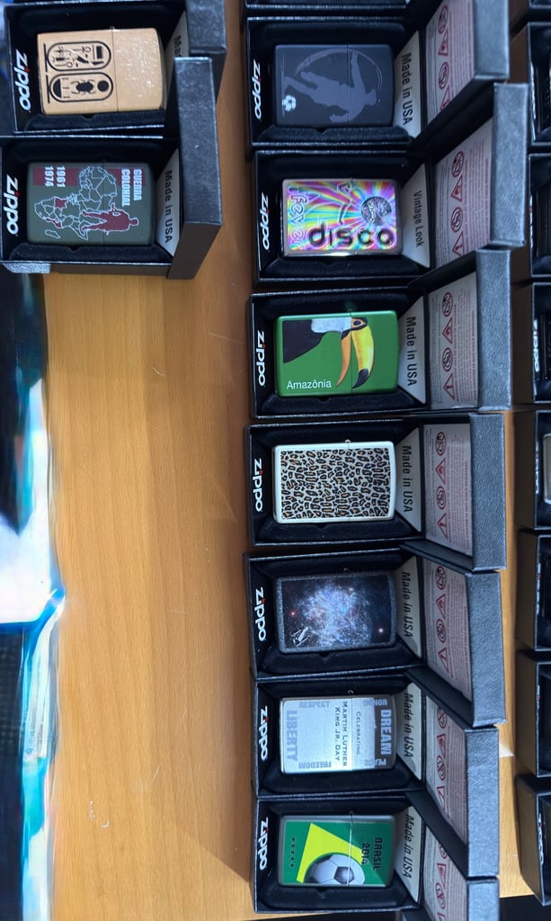 Zippo premium collection 104 lighters, display cases plus extras brand new unused 