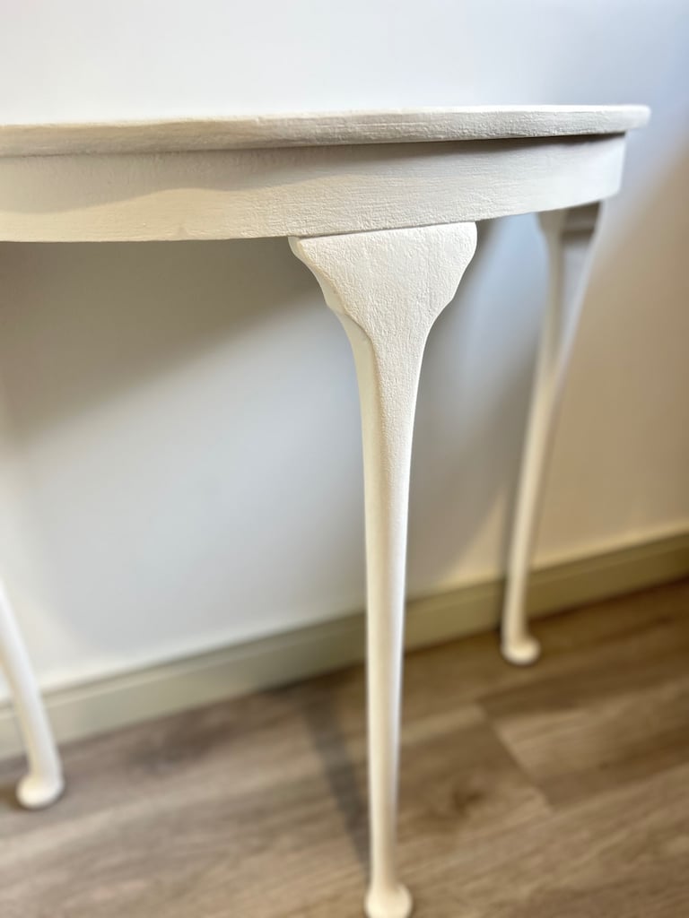 Elegant refinished hall table with ghost stripes