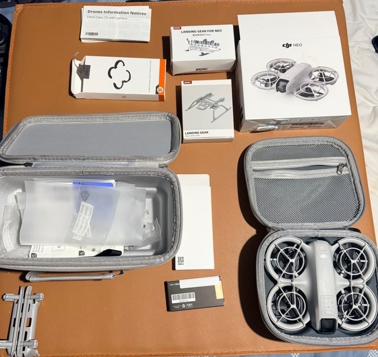 image for DJI Neo, boxed with carry case, accessories and 3 other drones