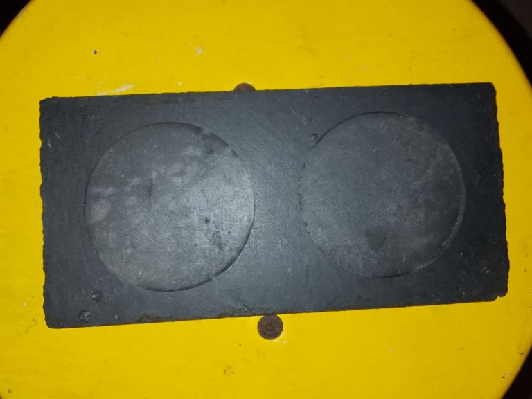 The Slate company coasters and candle stand